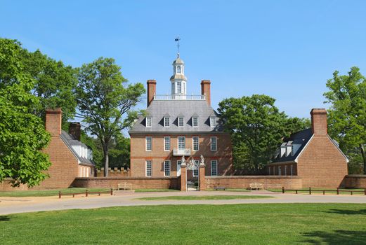 WILLIAMSBURG, VIRGINIA - APRIL 21 2012: The Governors Palace Building in Colonial Williamsburg, Virginia. The building dates from 1722 and was home to seven royal governors of the Virginia colonies.