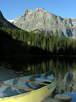 Canoe on a shore of Emerald Lake, Yoho National Park, British Columbia, Canada