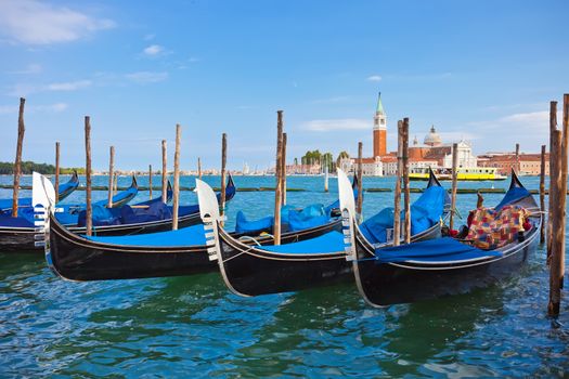 Beautiful view of Famous Venetian gondolas in Venice, Italy