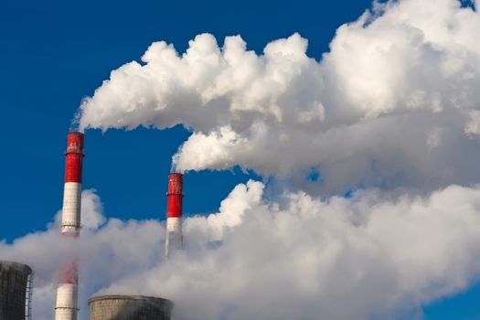 Industrial smoke rising from Power Station Cooling Towers