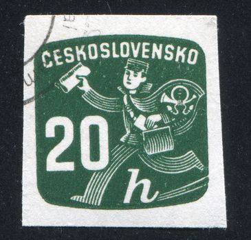 CZECHOSLOVAKIA - CIRCA 1945: stamp printed by Czechoslovakia, shows Newspaper Delivery
Boy, circa 1945