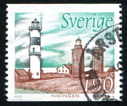 SWEDEN - CIRCA 1989: stamp printed by Sweden, shows Twin masonry lighthouses, and concrete lighthouse, Nidingen, circa 1989