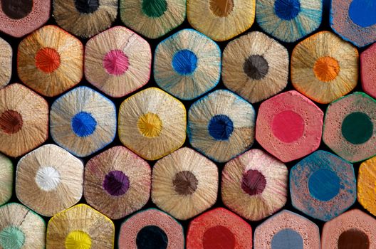 Background of Unsharpened Bottoms of Multi Colored Pencils closeup