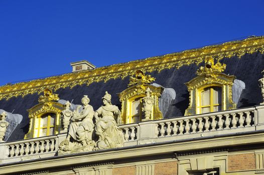 chateau de Versailles, architectural detail and gilding of the facade and roof