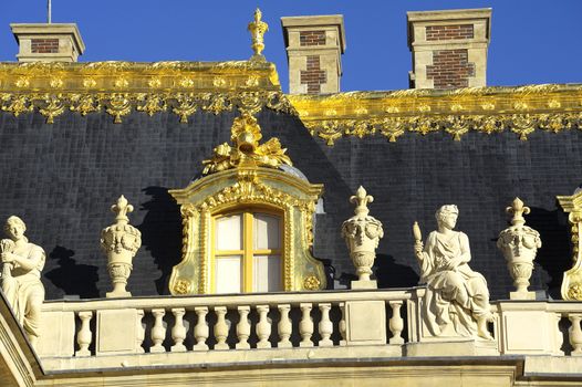 chateau de Versailles, architectural detail and gilding of the facade and roof