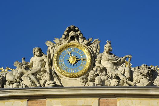 Versailles castle clock lying in the marble courtyard above the King's Chamber sun, Louis XIV