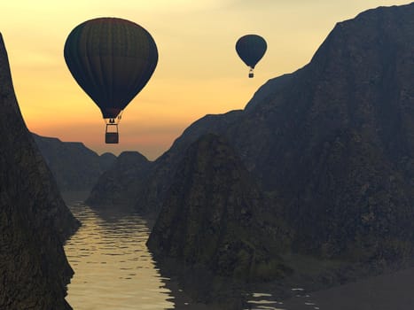 Two hot-air balloons during flight over mountains