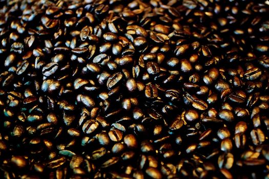 Black coffee beans placed on the background.