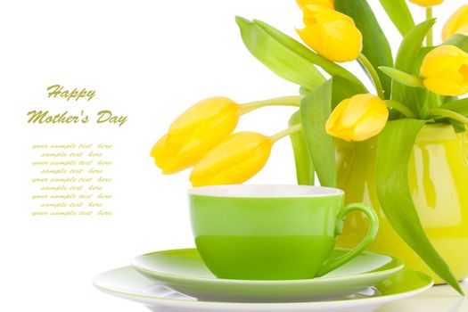yellow tulips flowers with cup tea, on a white background. breakfast for mommy, happy mothers day, morning drink, romantic still life, fresh flowers