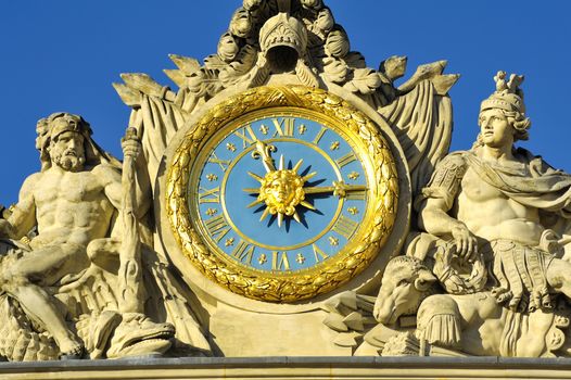 Versailles castle clock lying in the marble courtyard above the King's Chamber sun, Louis XIV