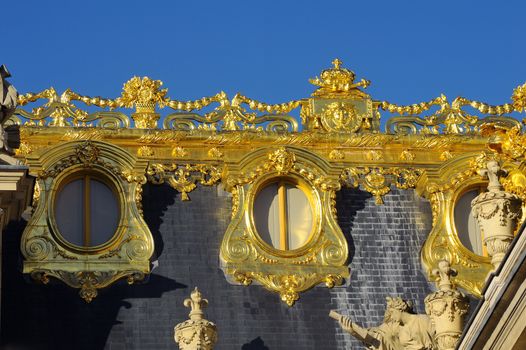 Castle of Versailles, architectural detail and gilding of the facade and roof