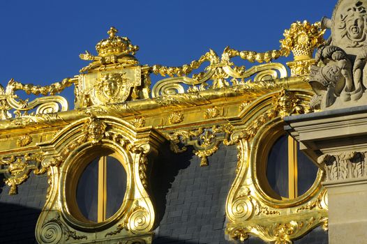 Castle of Versailles, architectural detail and gilding of the facade and roof