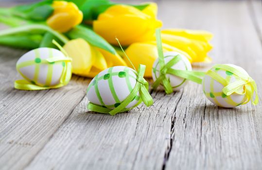 Easter eggs on wooden background