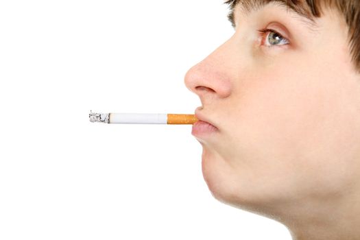 Side view of Teenage Face with cigarette on the White Background