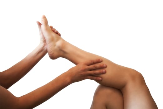 male hands massaging female foot isolated on white background