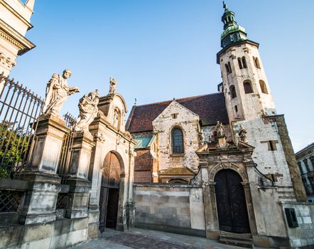 KRAKOW, POLAND - AUGUST 24: The early Baroque Church of St. Peter and St. Paul and the statues of the twelve apostles on Grodzka in the city of Krakow in Poland on 24 august 2013. Dates from 1596.