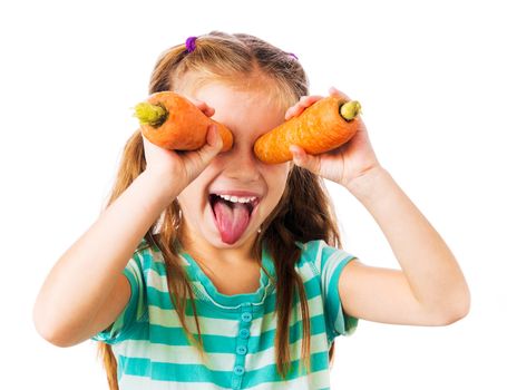 little girl with two carrots shows tongue isolated on white background