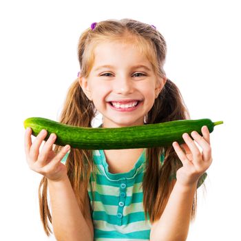 little girl with cucumber isolated on white background