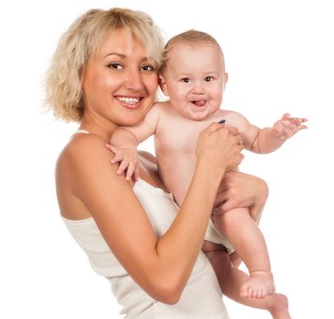 Young smiling woman with a baby in her arms. Isolated on white