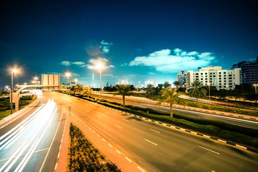 Night urban street with lights from cars