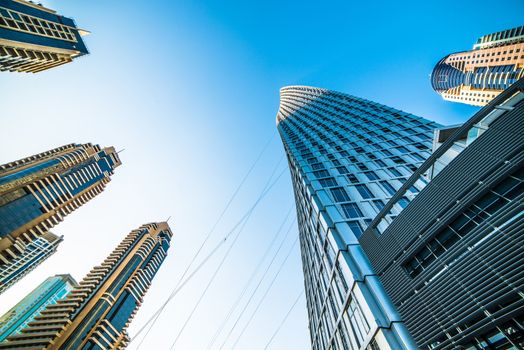 Looking up Lower Dubai skyscrapers