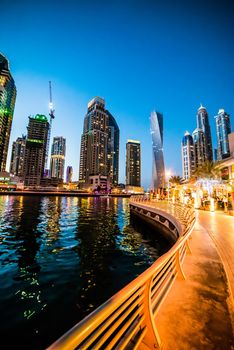 DUBAI, UAE -DECEMBER 14: View of the region of Dubai - Dubai Marina is an artificial canal city, carved along a two mile (3 km) stretch of Persian Gulf shoreline on december 14, 2013, Dubai, UAE.