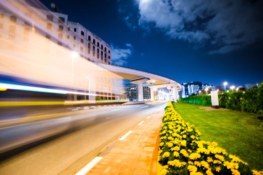 Night urban street with blurred cars