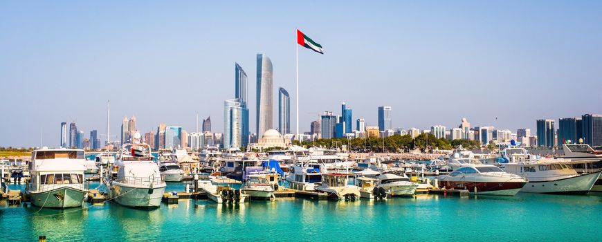 quay with yachts and skyscrapers in Abu Dhab