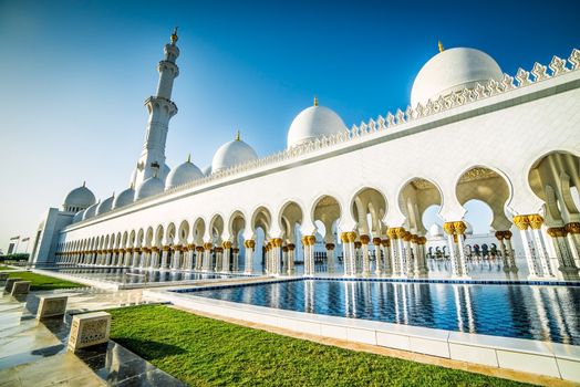 Sheikh Zayed Mosque in Middle East United Arab Emirates with reflection on water.