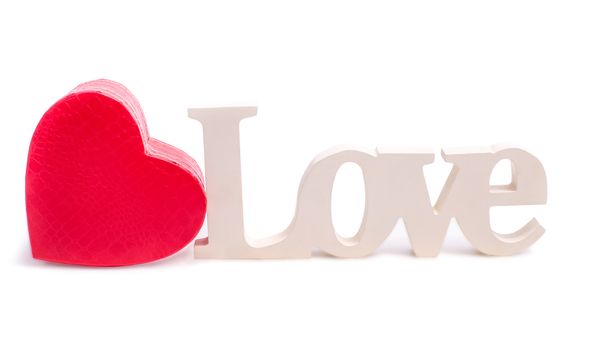 Red heart and the word love isolated on white backgraund