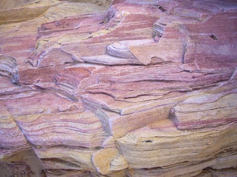Layers of pink and yellow sandstone in Valley of Fire State Park, Nevada