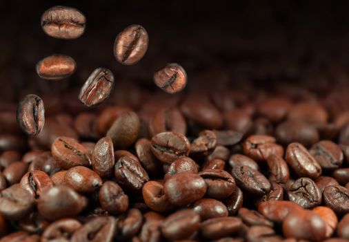 Falling coffee beans as a background with copy space