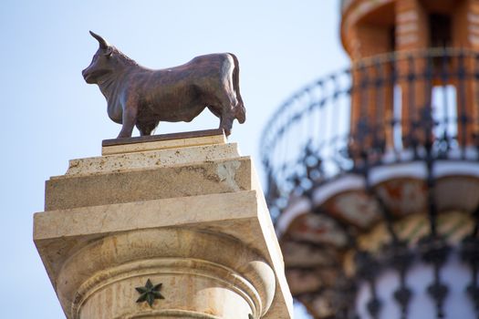 Aragon Teruel El Torico statue and modernist building in Plaza Carlos Castel square at Spain