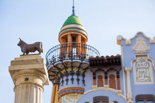 Aragon Teruel El Torico statue and modernist building in Plaza Carlos Castel square at Spain