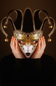 portrait of a woman with Venice mask of Jester