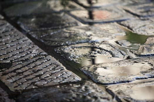 Wet cobblestone