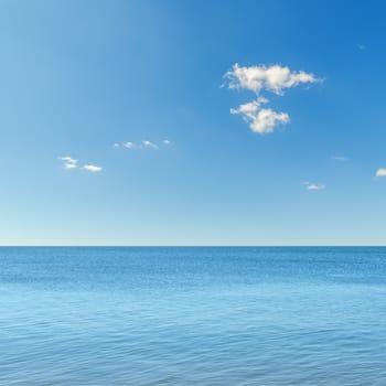 blue sky with clouds over sea