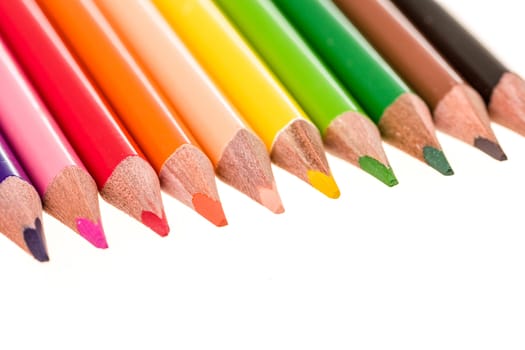 Colour pencils isolated on white background close up