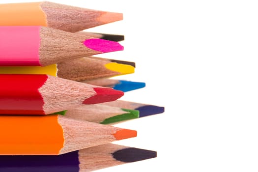 Colour pencils isolated on white background close up