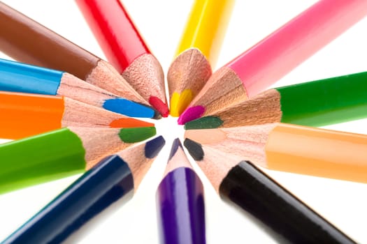 Colour pencils isolated on white background close up