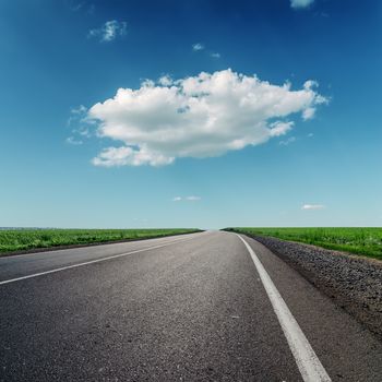 one big cloud and asphalt road