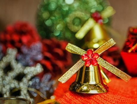 Festive Christmas golden bells photographed close-up background