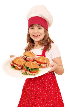 happy little girl cook hold plate with sandwiches