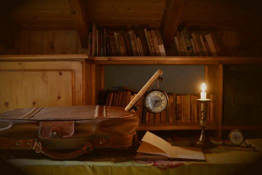 Time pleasure of reading and traveling, suitcase clock books, vintage style photo