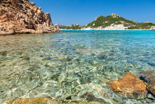 Clear turquoise water of Cala Corsara cove at Maddalena Archipelago in Sardinia