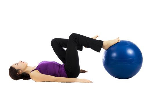 Woman training with a pilates ball (Series with the same model available)