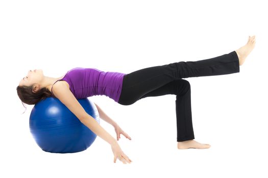 Woman doing exercises with a pilates ball (Series with the same model available)