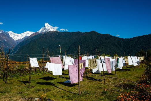 Laundry drying with the Machapuchre in the background, Nepal