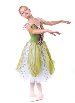 Beautiful young ballerina on a white background