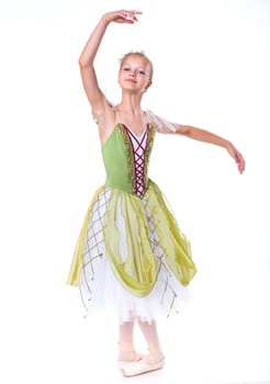 Beautiful young ballerina on a white background